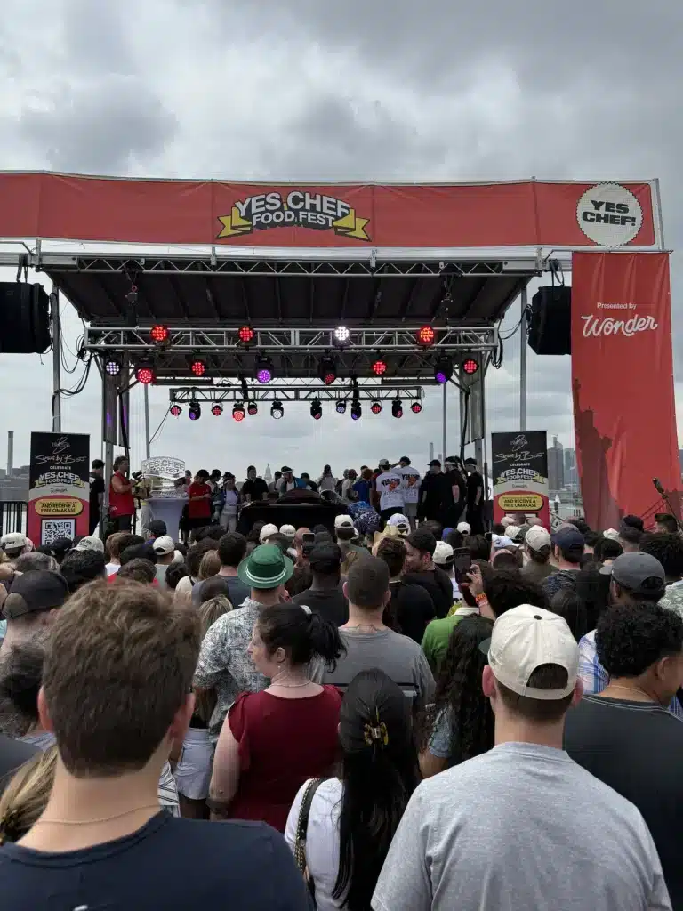 Saying Yes A crowd gathered around the outdoor stage at Yes Chef Food Fest.