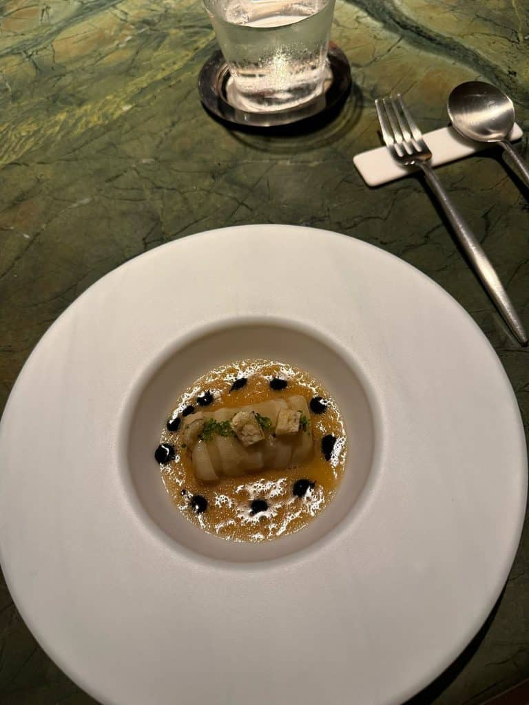 São Paulo Luxury Travel A tasting-menu course served in a white bowl at Tuju in São Paulo
