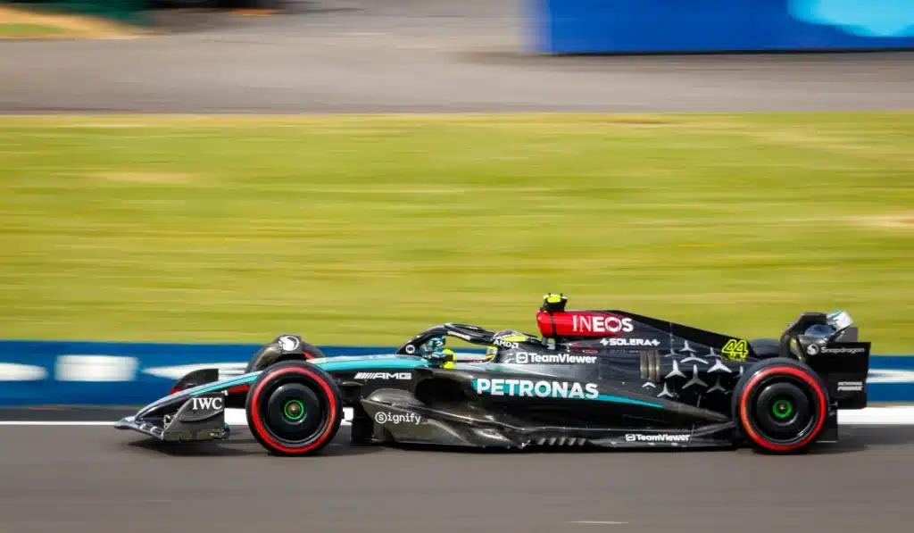 Lewis Hamilton Paintball Story Lewis Hamilton drives the black and turquoise number 44 Mercedes W15 at Silverstone in July 2024.