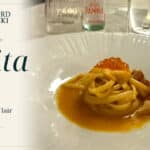 Nelita São Paulo review cover featuring a pasta dish from Richard Jarocki’s meal and his logo.