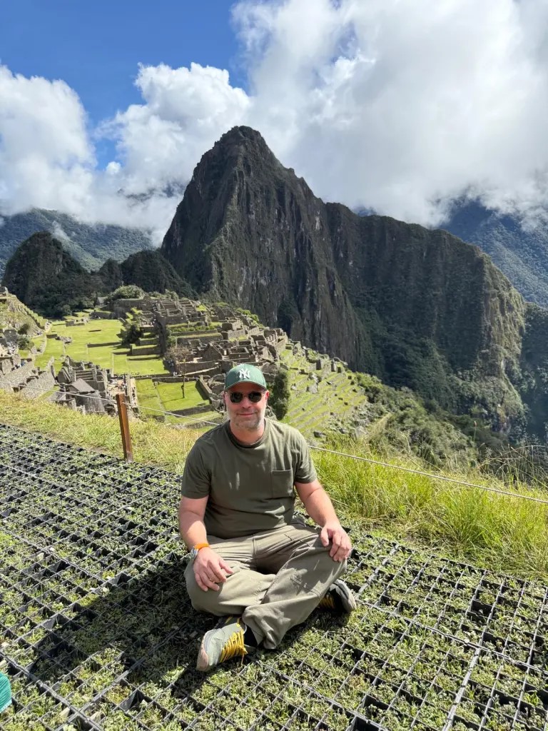 Richard Jarocki at Machu Picchu after reaching the ruins without hiking the Inca Trail