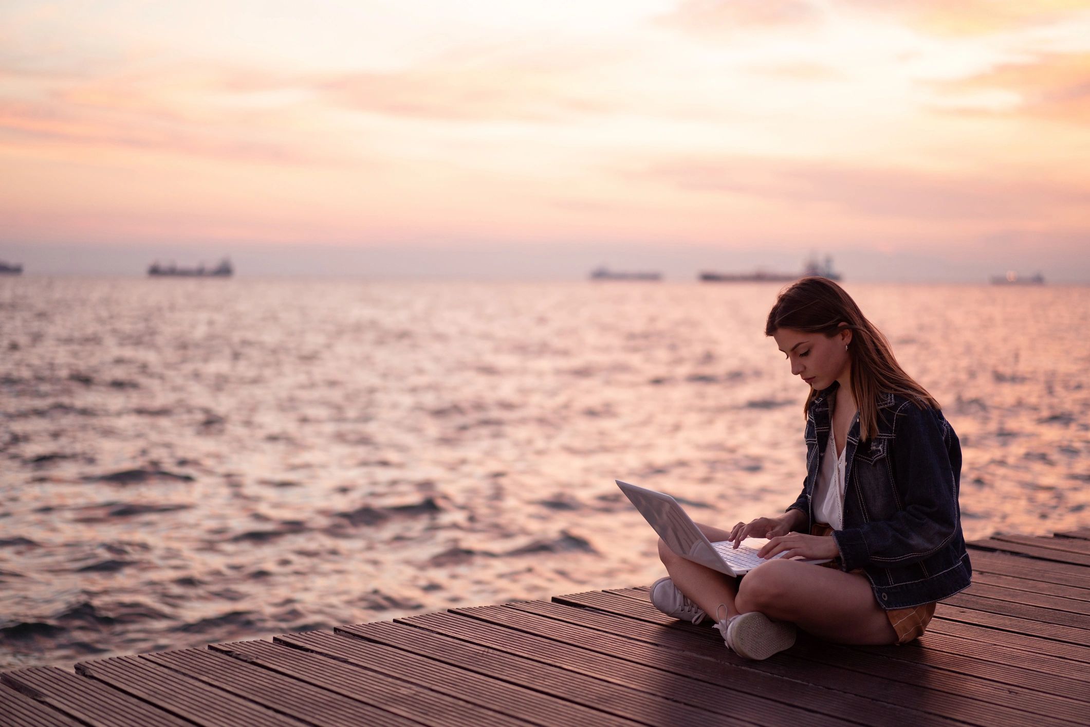 Travel creator working by the sea