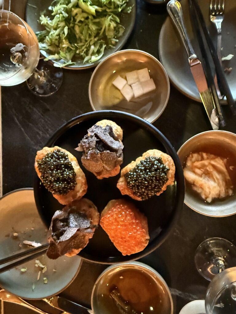 COQODAQ's Golden Nuggets featuring 18 Karat with ocean trout roe, 24 Karat with Tsar Imperial® Daurenki caviar, and Black Gold with seasonal truffle in New York City.