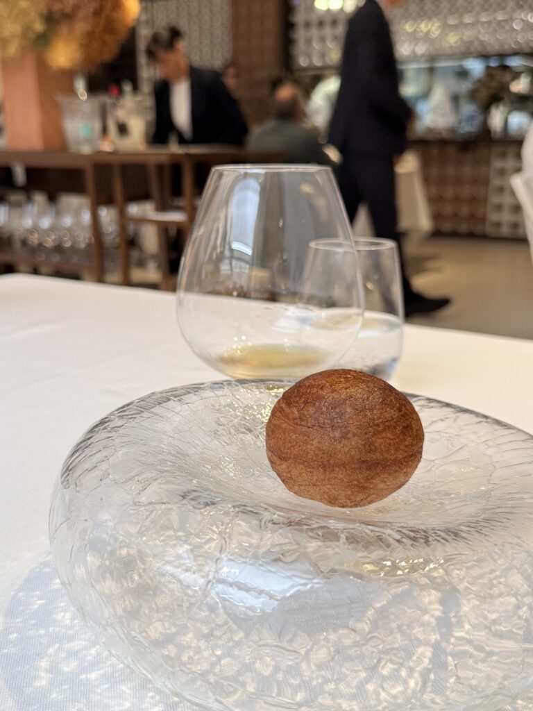 Disfrutar's signature caviar-filled doughnut served on the tasting menu in Barcelona, Spain.