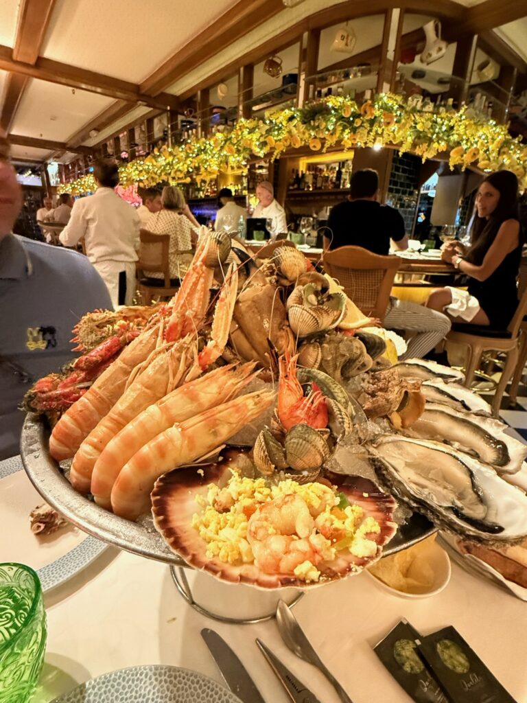 Botafumeiro's signature seafood platter featuring oysters, scarlet prawns, crab, shellfish, and fresh seafood in Barcelona, Spain.