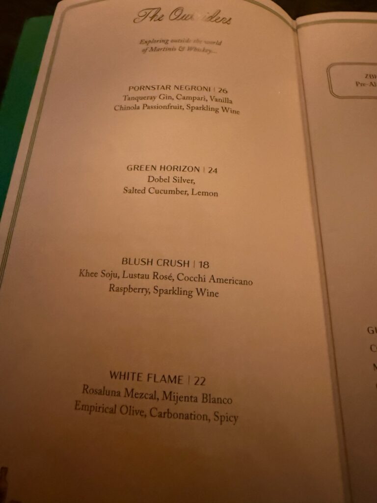 The signature cocktail menu at Bar Chimera inside 550 Madison in New York City, featuring house creations including the Pornstar Negroni and Green Horizon.