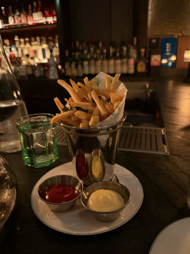 Crispy tallow fries served at Bar Chimera inside 550 Madison in New York City