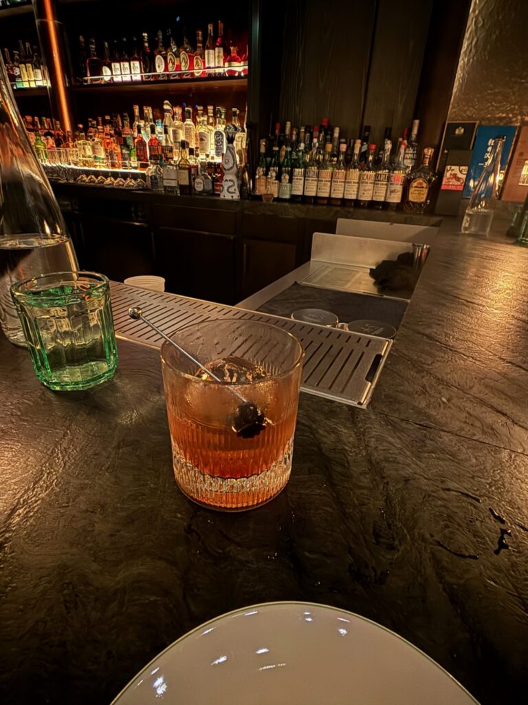 An Old Fashioned cocktail served at the Whiskey Bar inside Bar Chimera at 550 Madison in New York City.