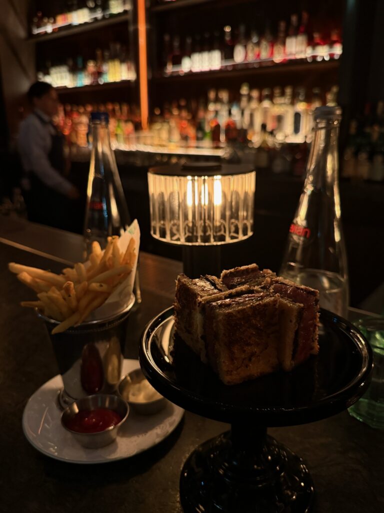 The A5 Blackjack Sandwich served with crispy tallow fries at Bar Chimera inside 550 Madison in New York City.