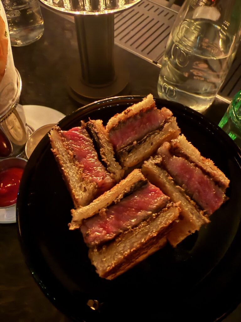 Bar Chimera's A5 Blackjack Sandwich made with Kagoshima A5 Wagyu and Périgord black truffle at 550 Madison in New York City.
