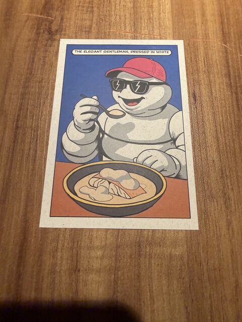 Illustrated card for “The Elegant Gentleman, Dressed in White” moqueca course at Evvai São Paulo