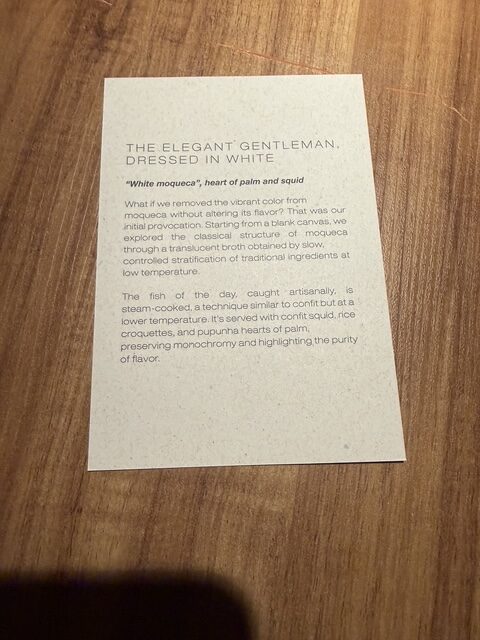 Menu card for Evvai’s white moqueca with fish, squid and heart of palm