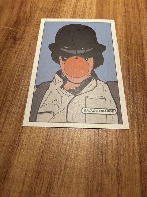 Illustrated Savage Orange tasting-menu card presented at Evvai São Paulo