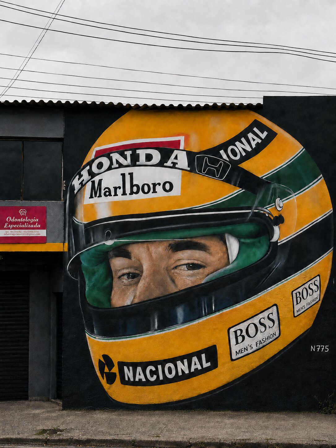 Ayrton Senna helmet mural beneath overhead wires in São Paulo