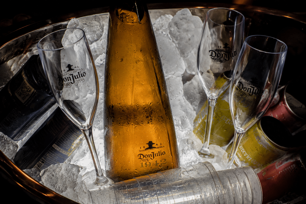 Chilled Don Julio 1942 bottle and branded glasses at the POSH Club Official Grand Prix Party in São Paulo