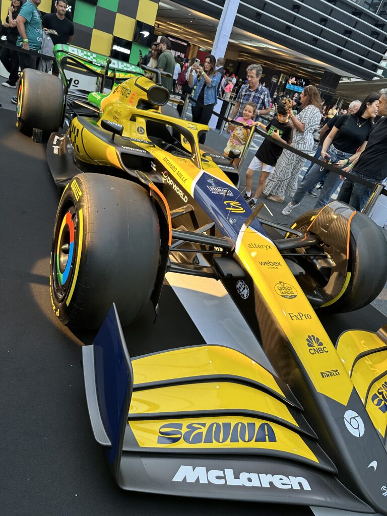 Yellow McLaren Formula 1 show car with Ayrton Senna branding displayed in São Paulo, Brazil
