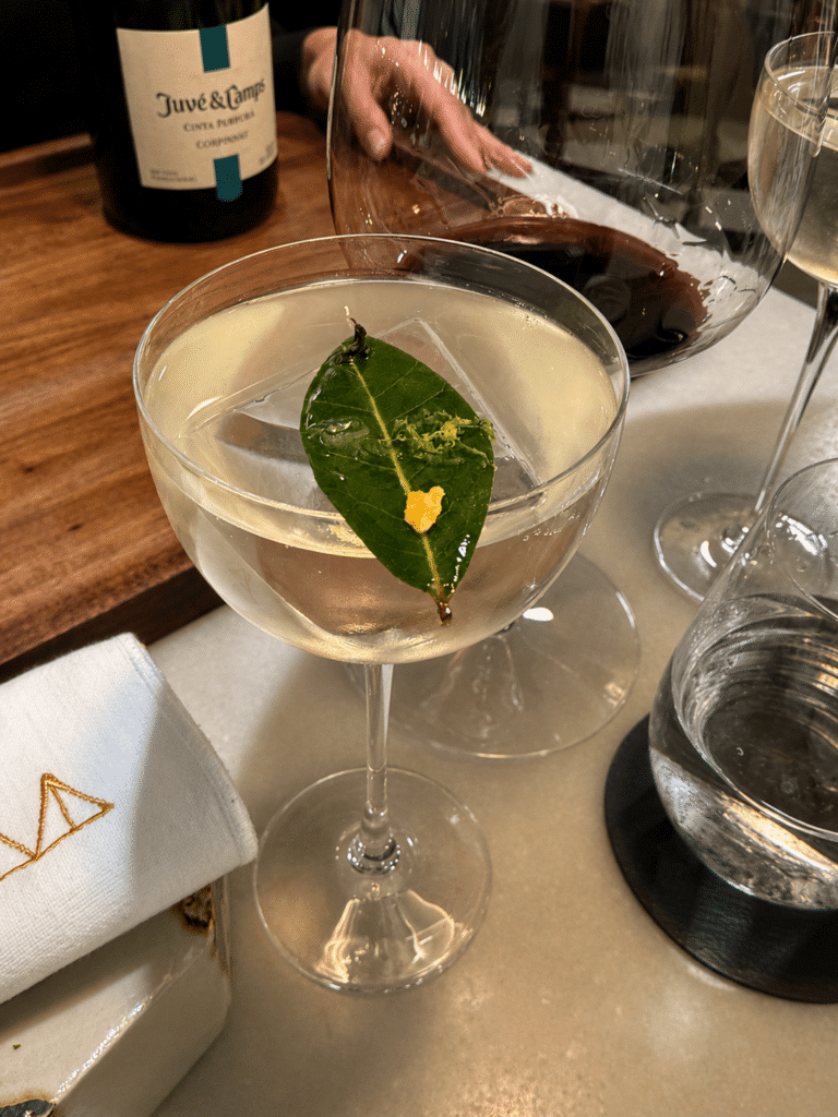 Gin, bay leaf, lime and smoked black tea drink at Mont Bar in Barcelona