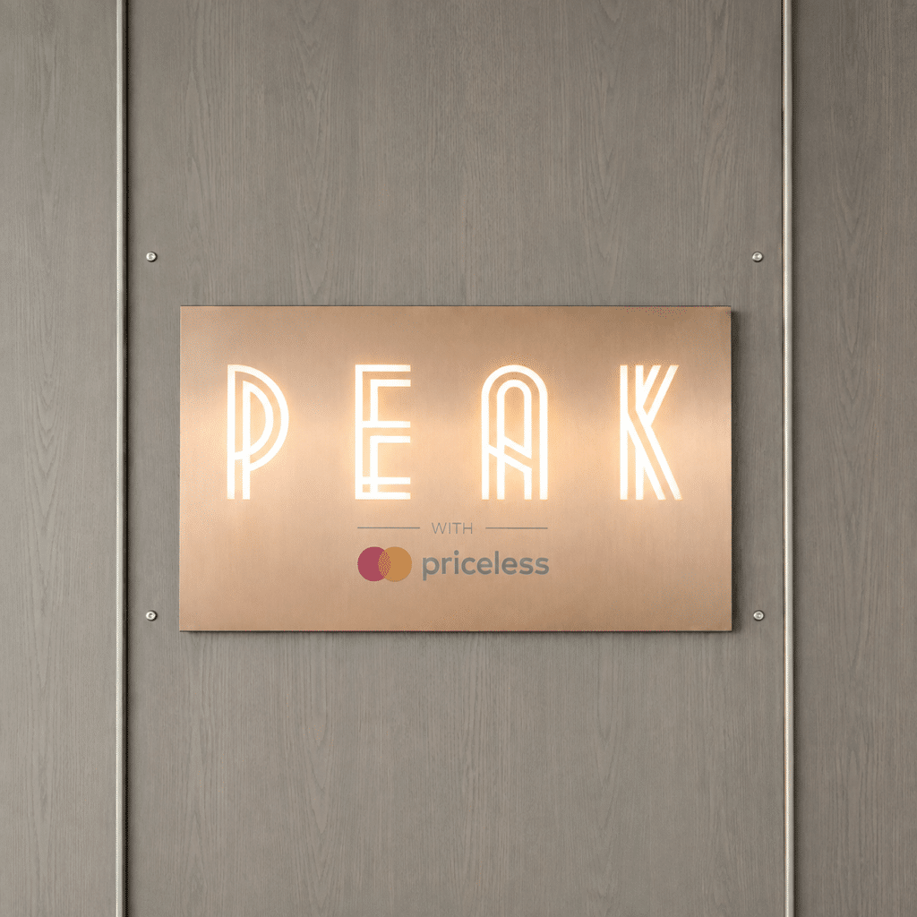 Peak with Priceless entrance sign at 30 Hudson Yards in New York City