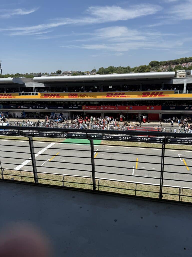 Wide view of the Formula 1 pit lane and team garages during the 2025 Barcelona Grand Prix