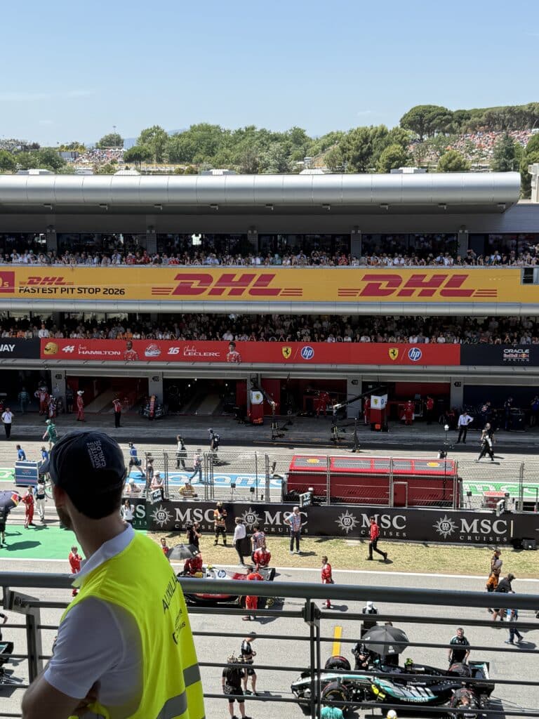 Ferrari and Mercedes Formula 1 cars on the pre-race grid at the 2025 Barcelona Grand Prix