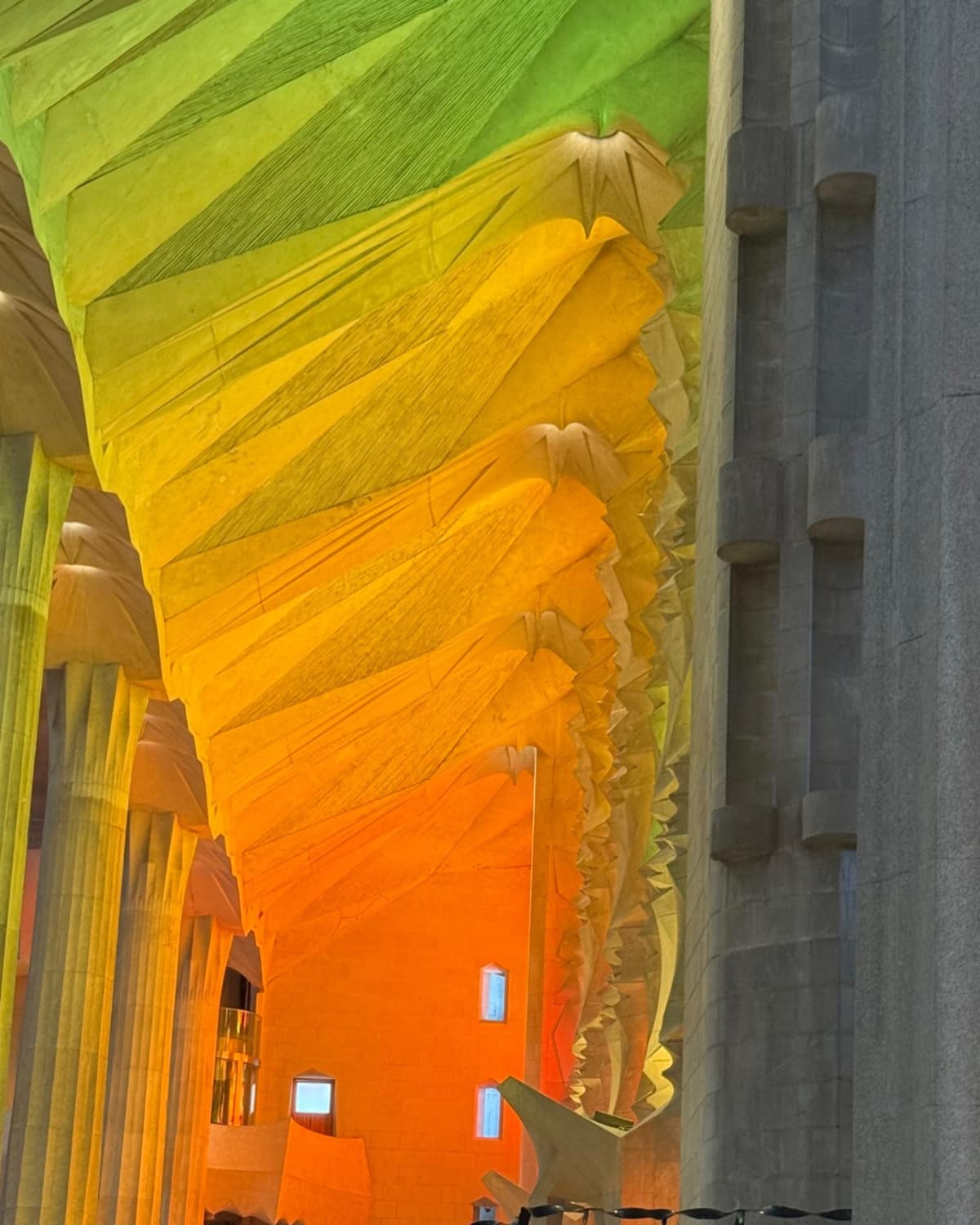 The branching columns and colorful light inside the Sagrada Família in Barcelona.