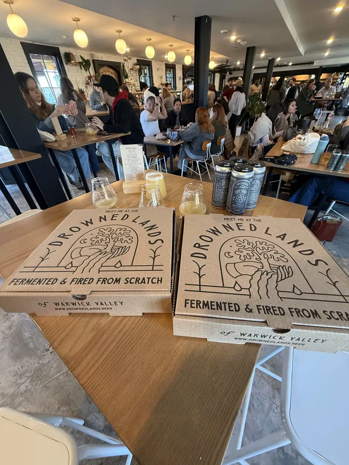 Closed Drowned Lands pizza boxes ready to take home