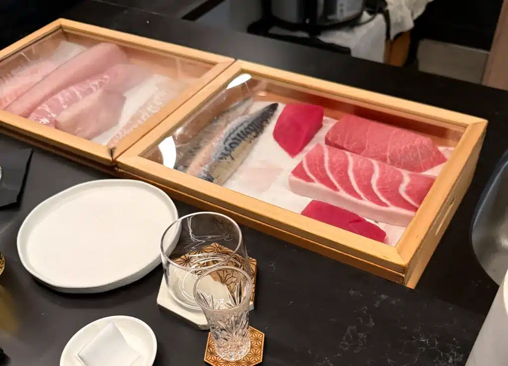 Fish arranged in a wooden display box at Sushi by Sea in Ridgefield, New Jersey.