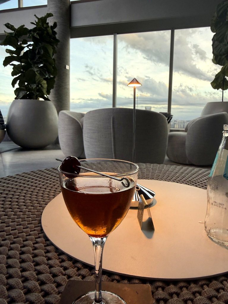 Cocktail at W São Paulo with city views after a Formula 1 race day